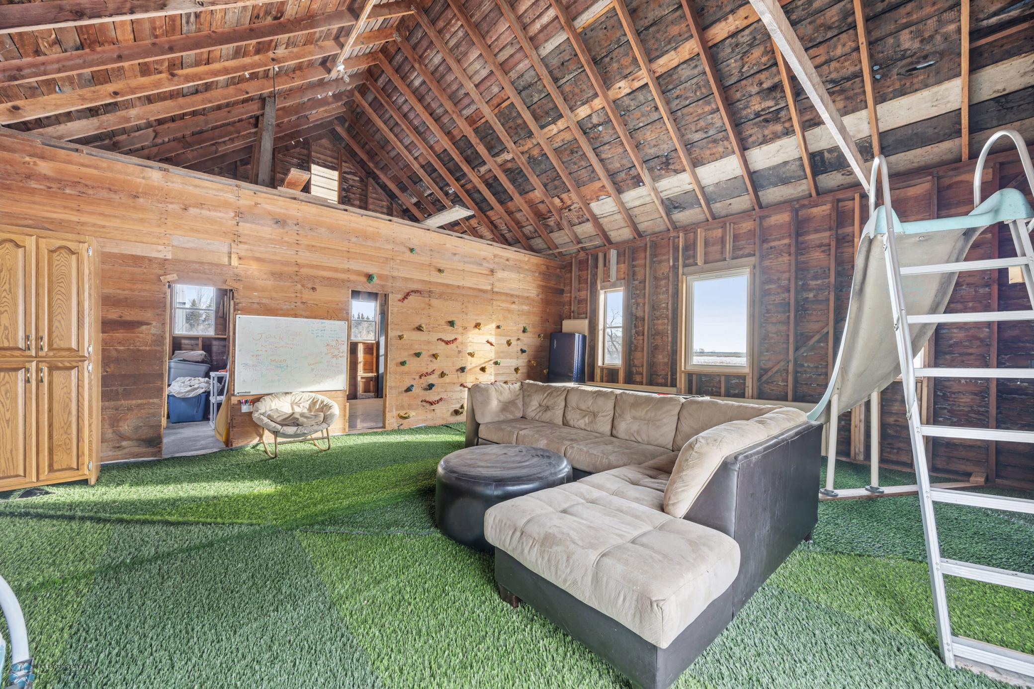 "Playhouse" - 32x24 (A), with "turf" carpet, rock climbing wall, and sport court!