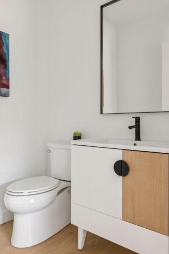 Main floor half, bath. Main floor has a total of 3 bathrooms.