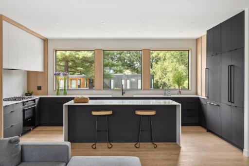 Kitchen island. Built and installed by Thomas Landin. Mixture of rift cut white oak, Rehau matte black and painted white