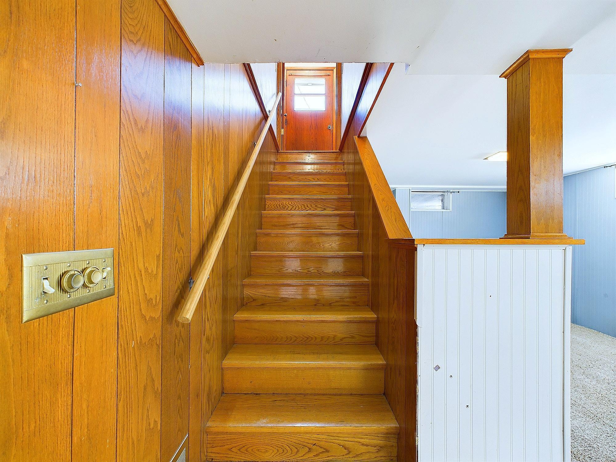 Stairs down to the lower level.