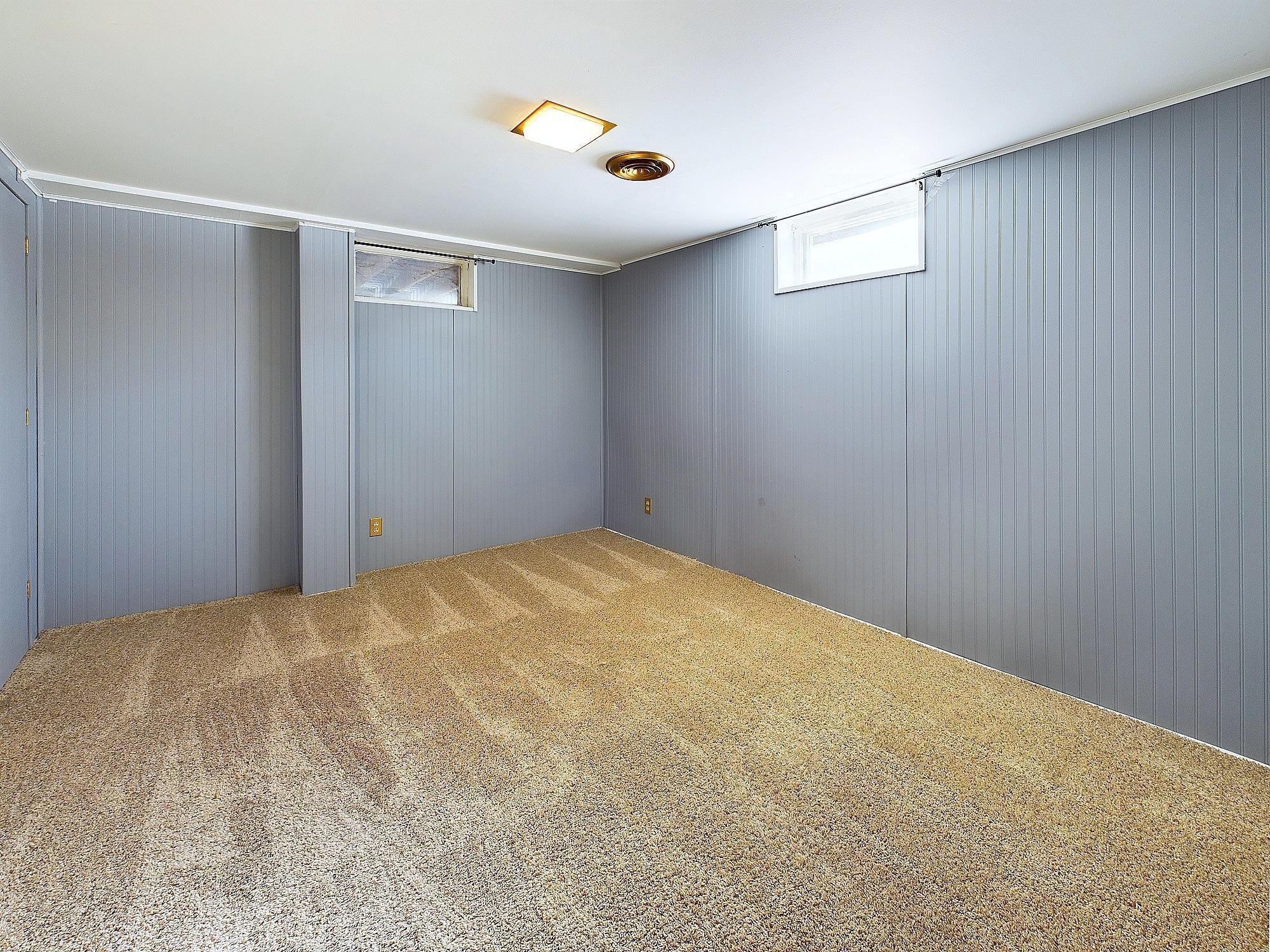 The other side of the half wall. Office space, yoga space, your own little library. So many possibilities!