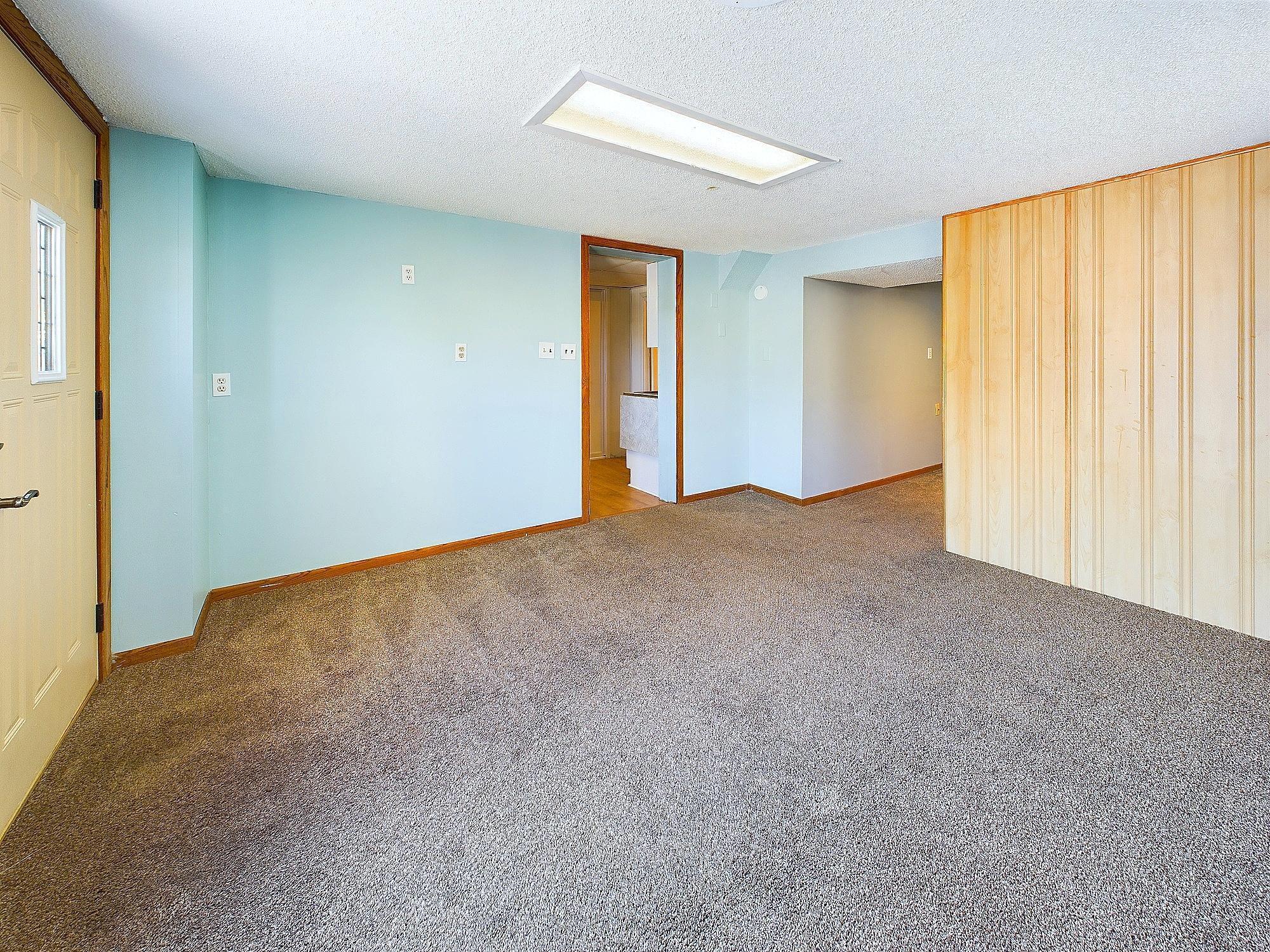 Living space in the studio space. That tan half-wall is non-load bearing.