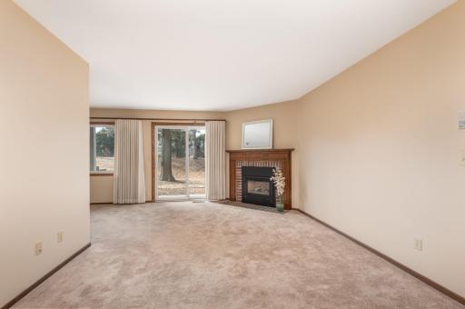 Living Room features a gas fireplace and walks out to the patio