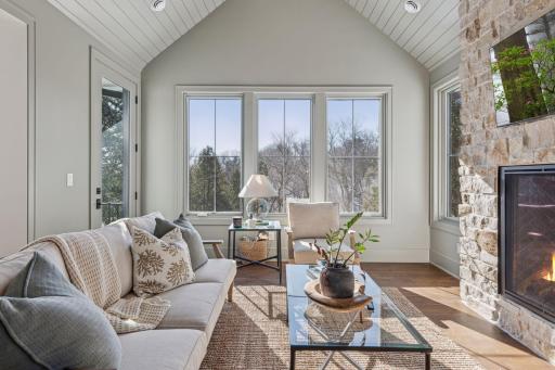 Enjoy the views, the fireplace or access the deck from the hearth room.