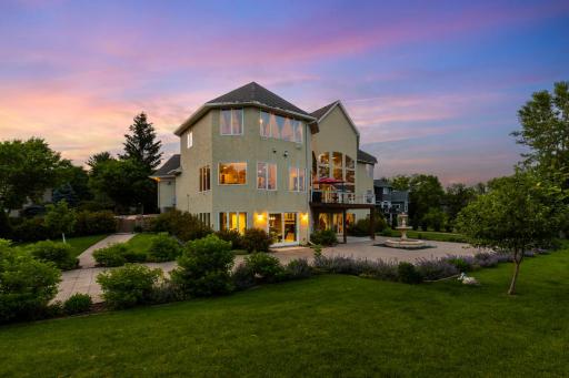 Expansive patio and deck spaces to fully enjoy outdoor living and breathtaking sunsets