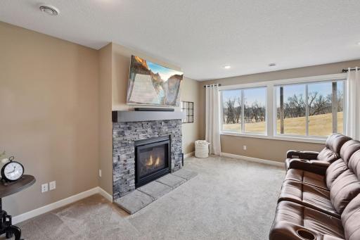Find an additional gas fireplace in the lower level