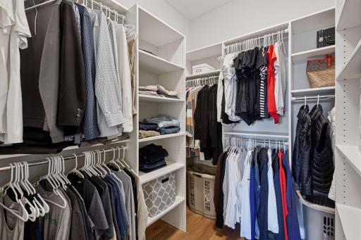 Walk through the primary bathroom to get to the large walk in closet. Bonus- the laundry room is next door to the primary closet!