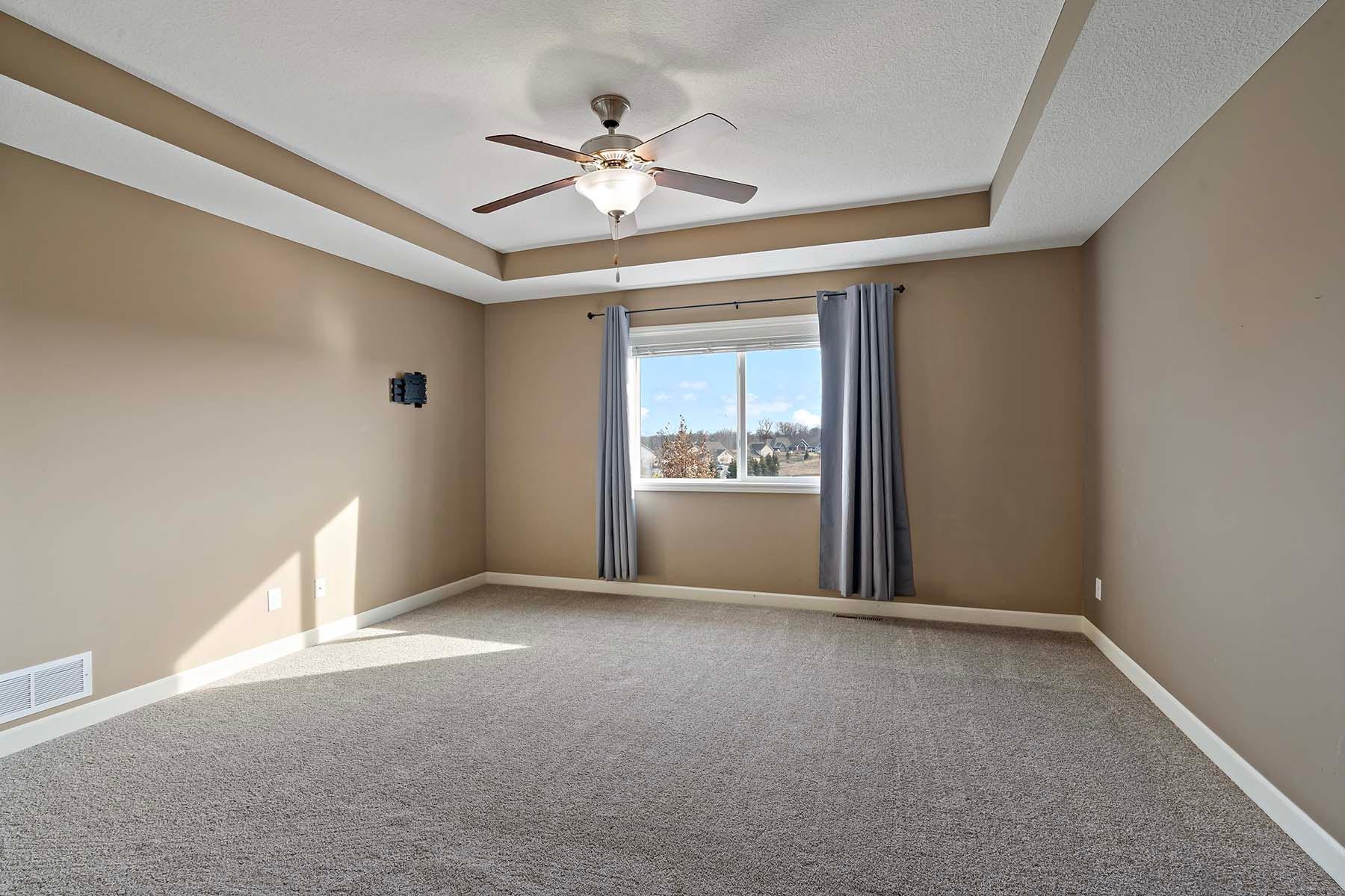 Primary bedroom. East facing windows. Upper level.