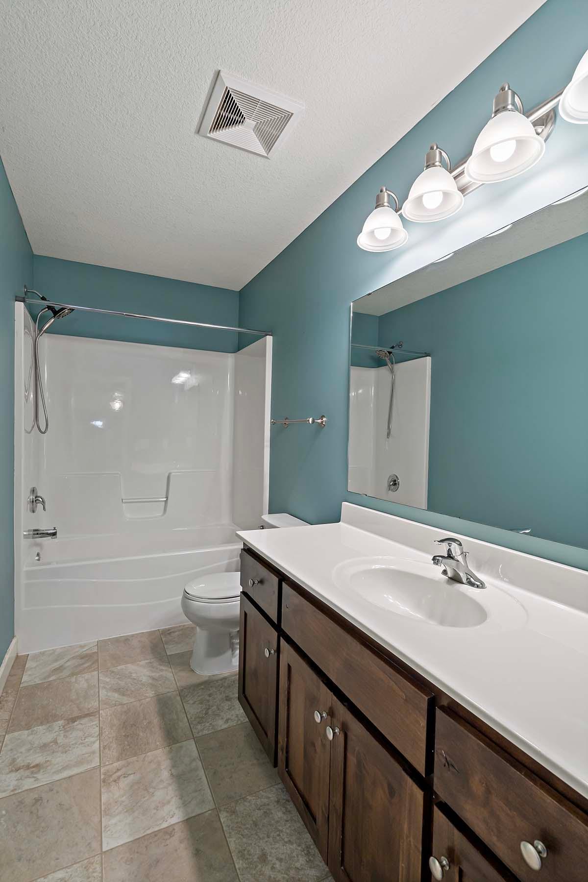 Full bathroom. Upper level outside bedrooms and loft area.