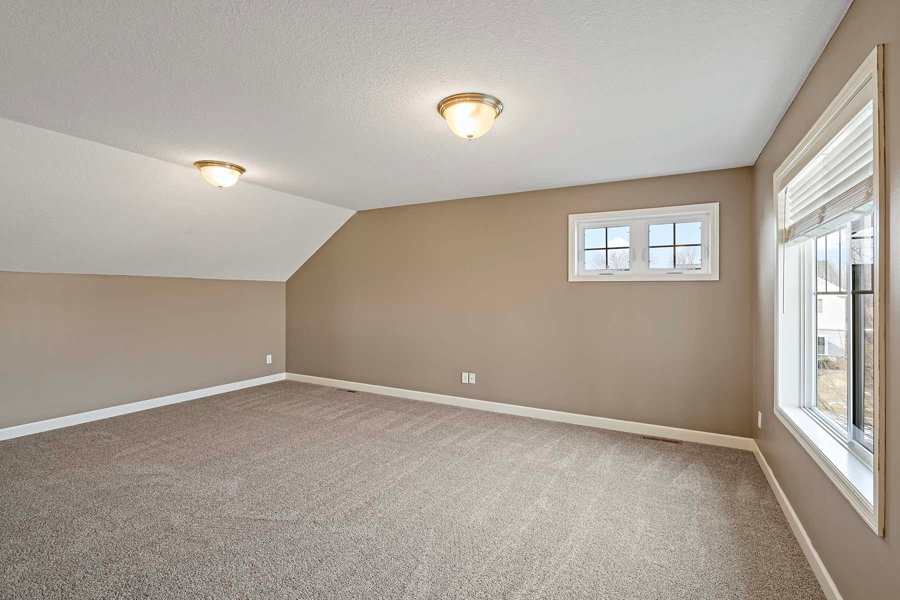 Upper level loft/bonus space.