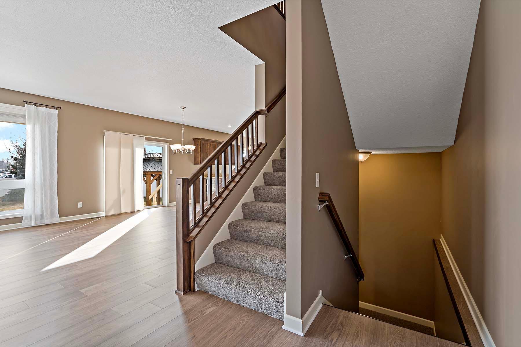 Inside the entry way. View of dining and living room
