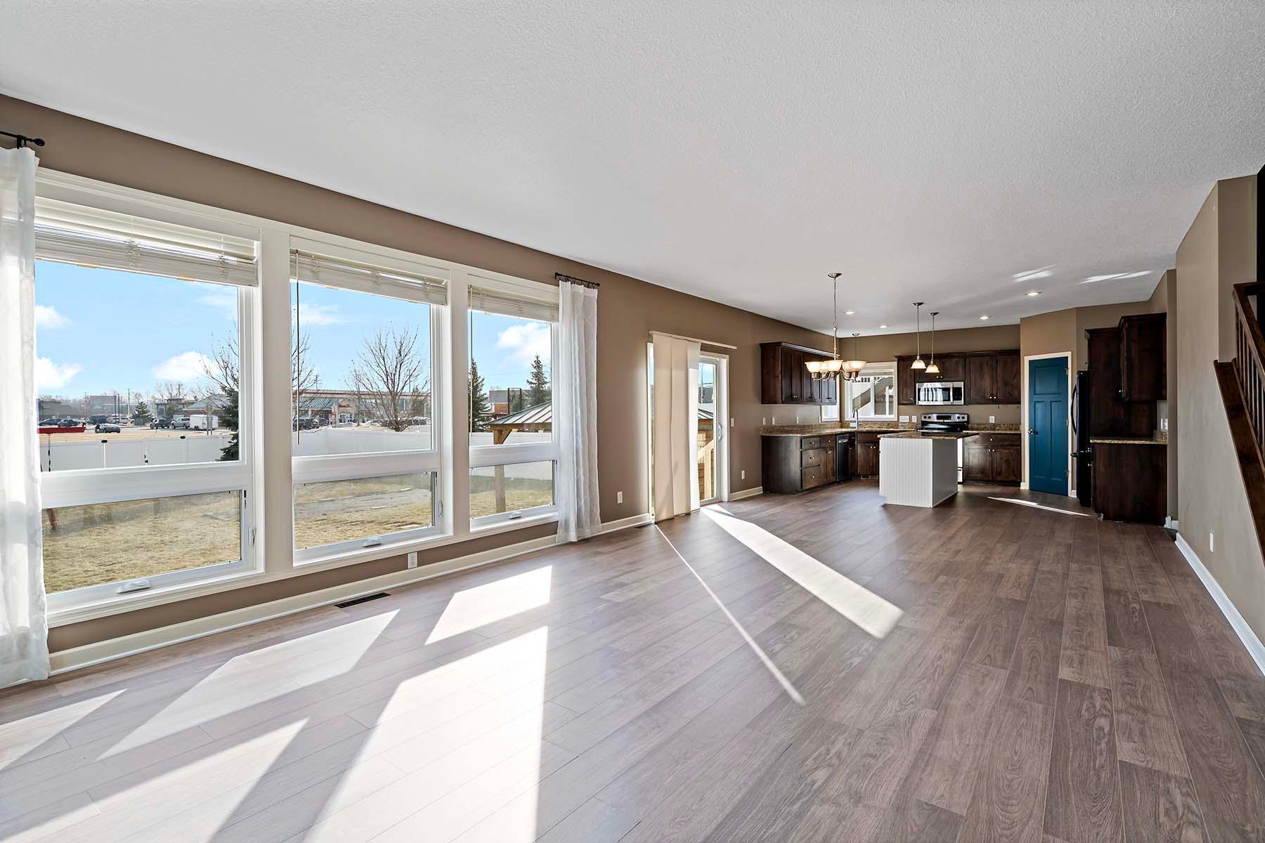 Open floor plan! Large East facing windows with view of fully fenced backyard.
