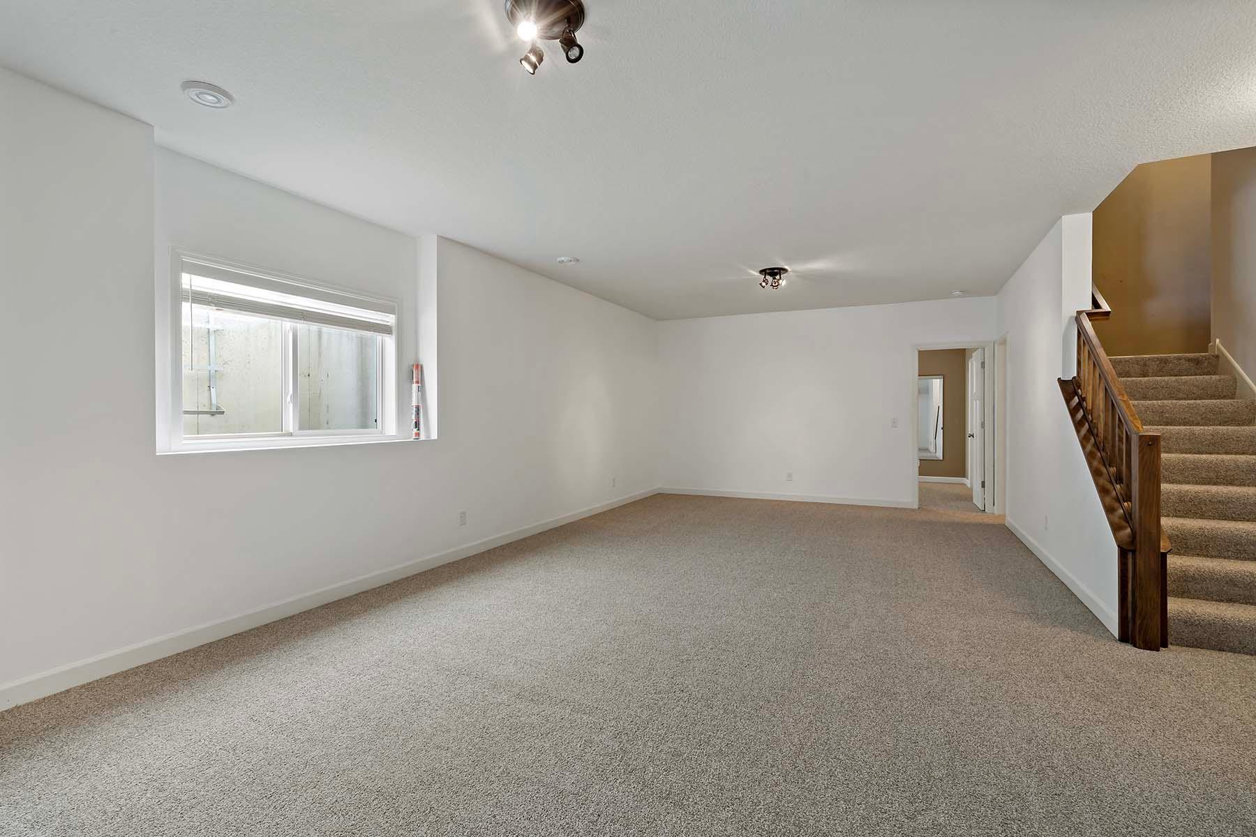 Lower level perfect for entertaining! Bedroom and bathroom straight back