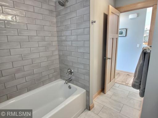 The full main level bath just completed a new tile upgrade bringing a fresh new look to the bathroom.