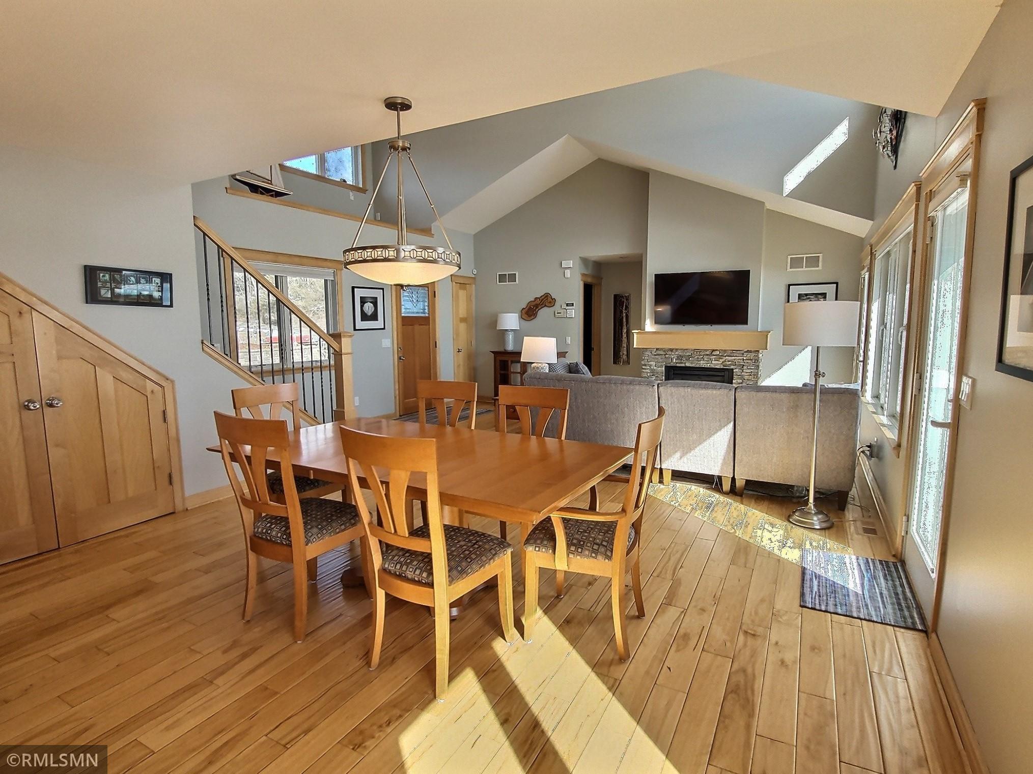 The kitchen and dining area has a door to the deck for easy access when bringing out food and beverages.
