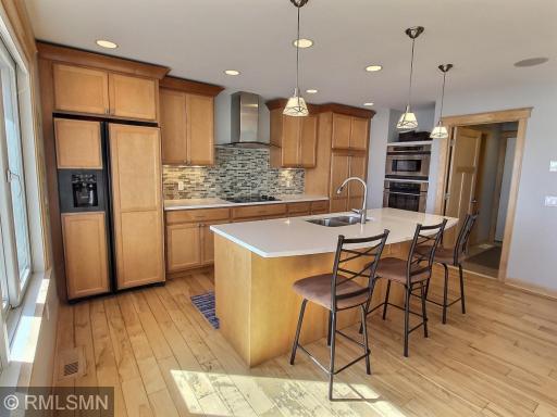 The kitchen is tastefully finished and opens up to the rest of the main level perfect when entertaining at the lake. The center island work station keeps you a part of the conversation.