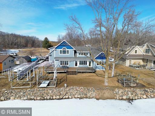 The best of elevation on this prime Sugar lake lot. Check out the deck, now this is the size of the deck you need lakeside. Just a little meandering stroll down to the lake.