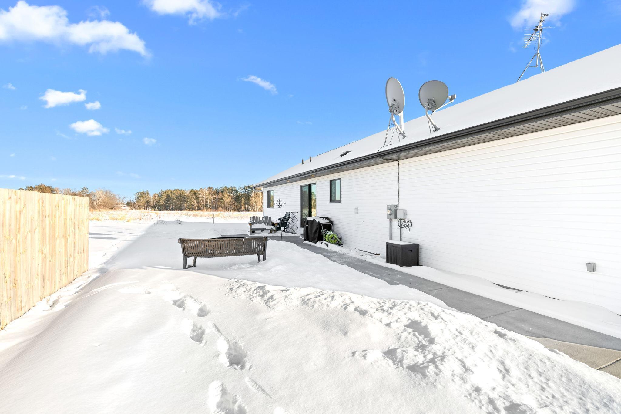 Side entrance w/ outdoor living space