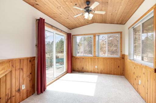 Main Level Sun-Room leads to Pool and Deck