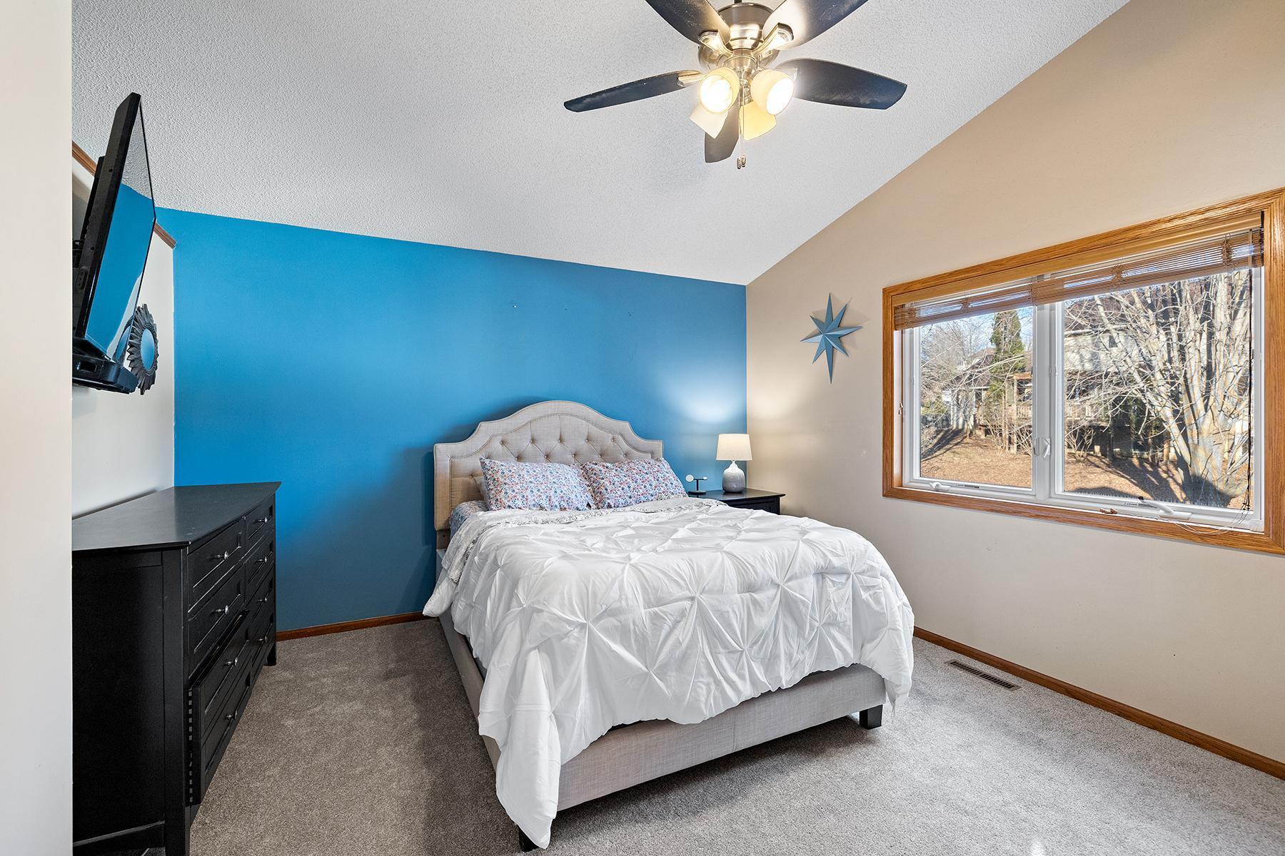 Primary suite with view of the backyard