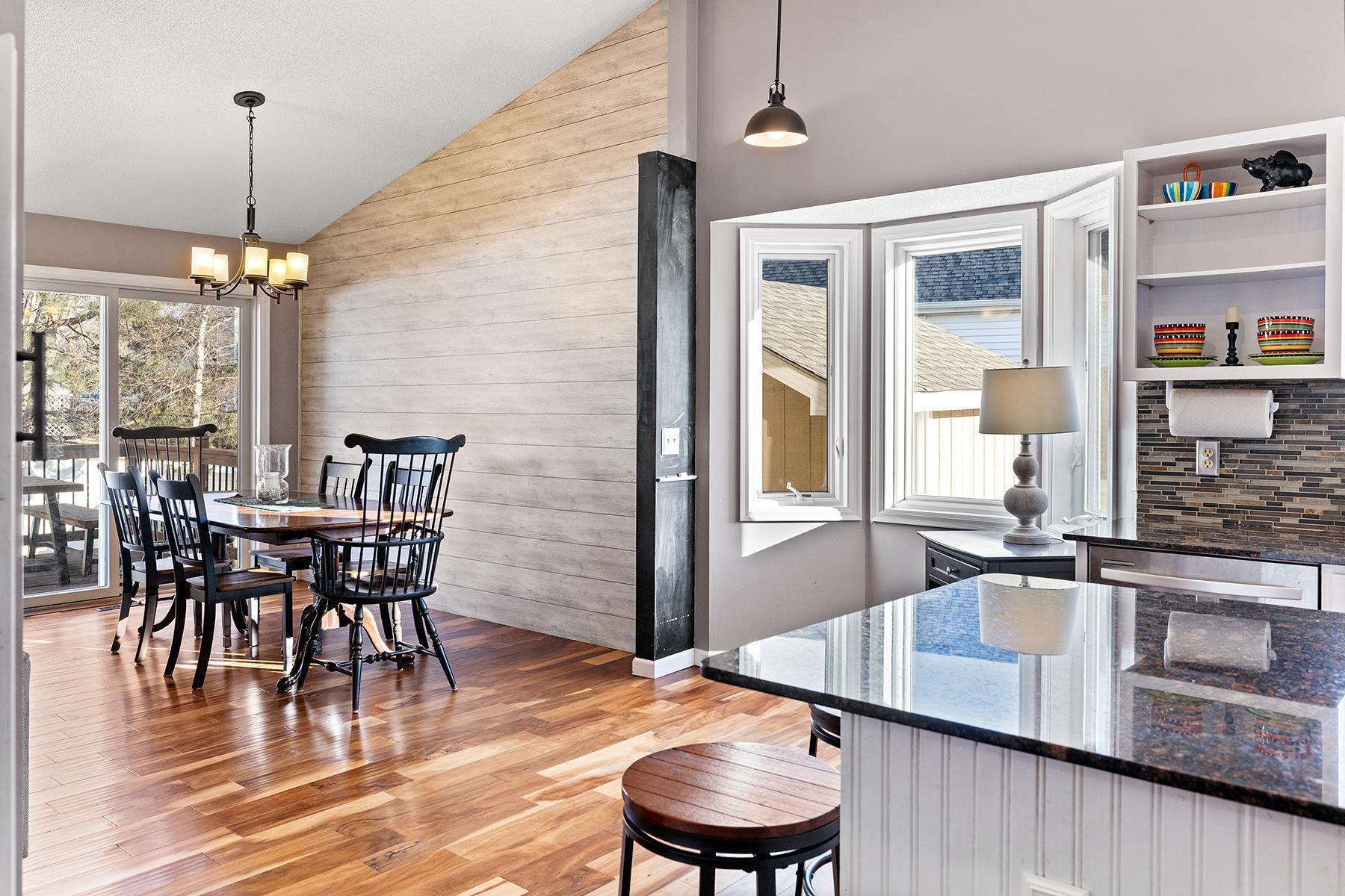 South facing bay window between the kitchen and the dining