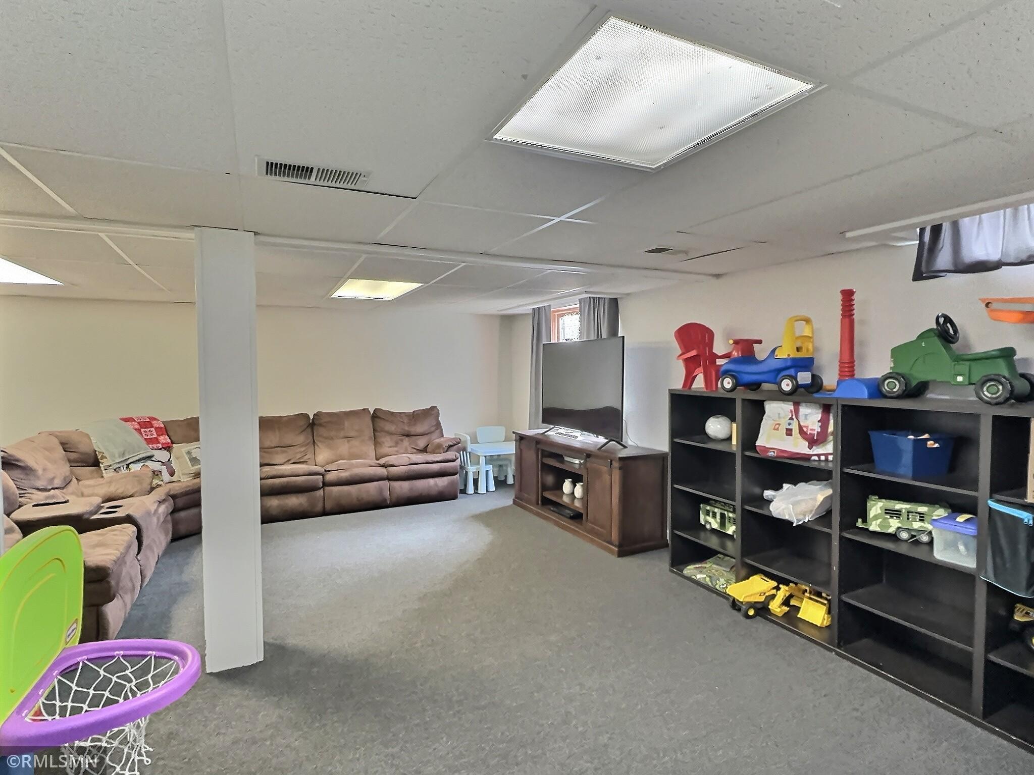 A recently finished basement complete with a spacious family room offers great space to spread out.