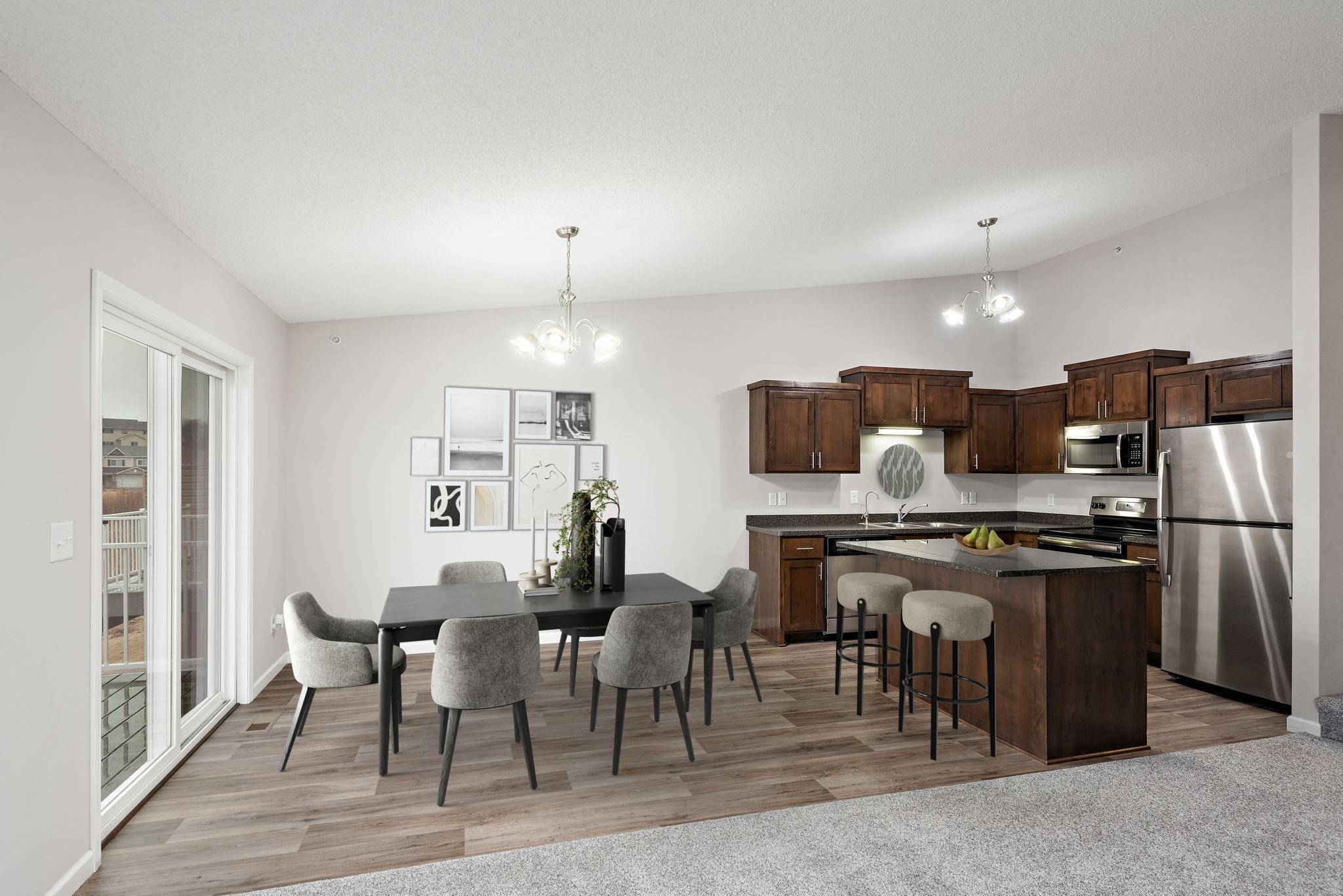 Dining Room has sliding glass door for you to walk out to your maintenance free deck!