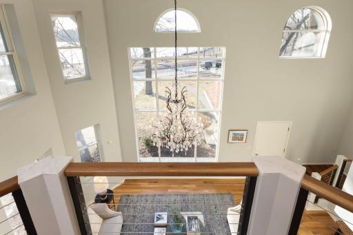 Second story lookout over the formal living room and capturing lake views.