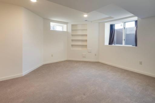 One of two large bedrooms with walk in closets in the lower level.