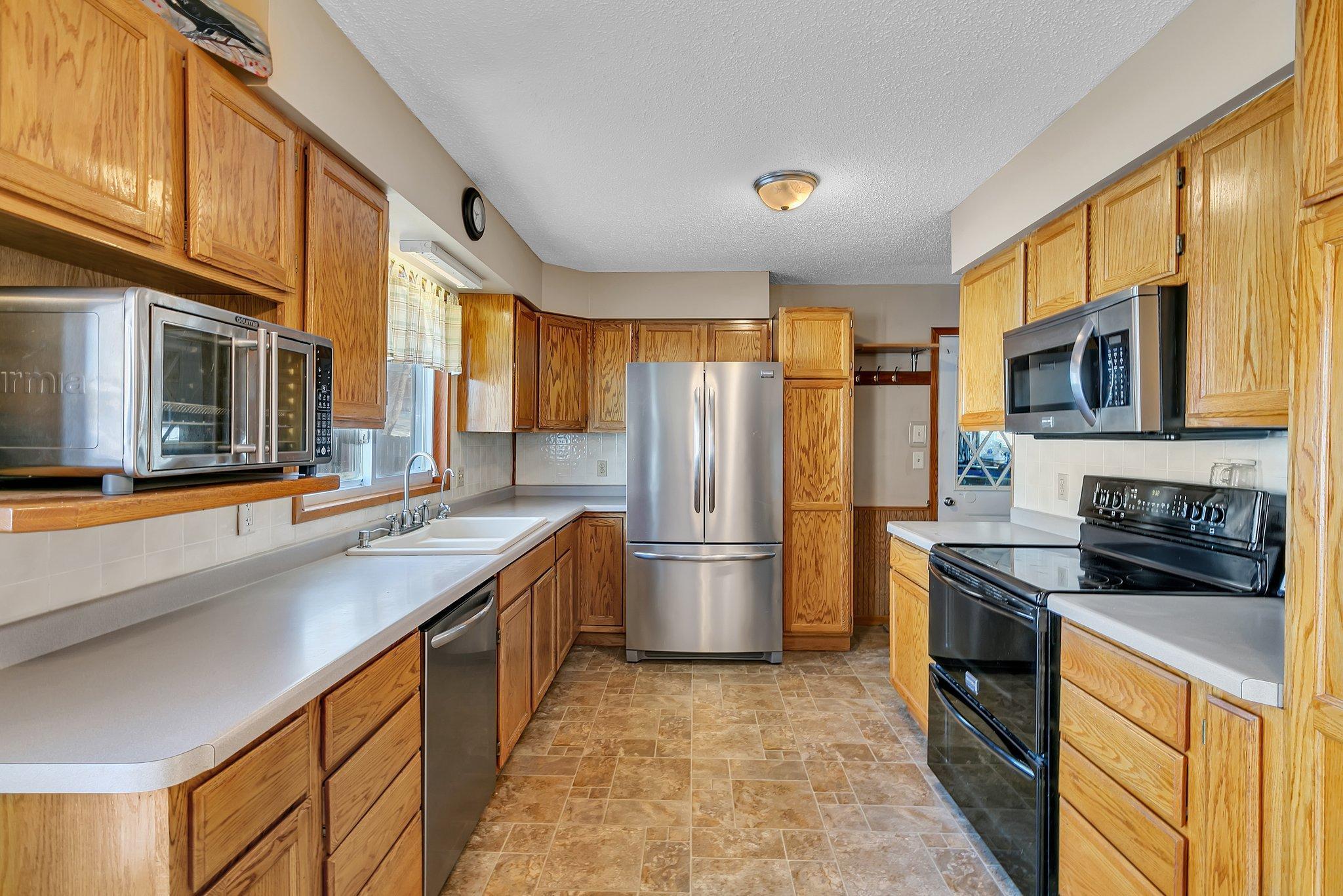 Black stove will be switched out for a new stainless steel one.