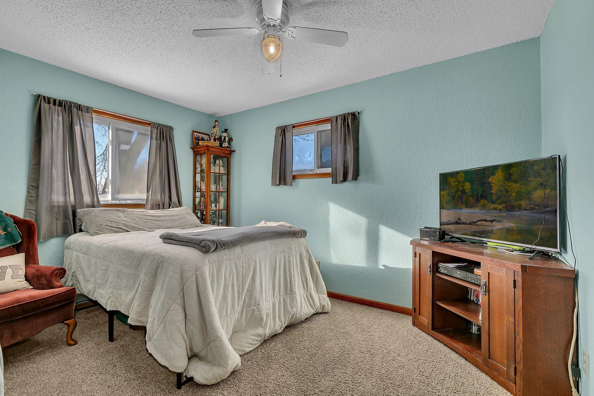 One of three upper level bedrooms.