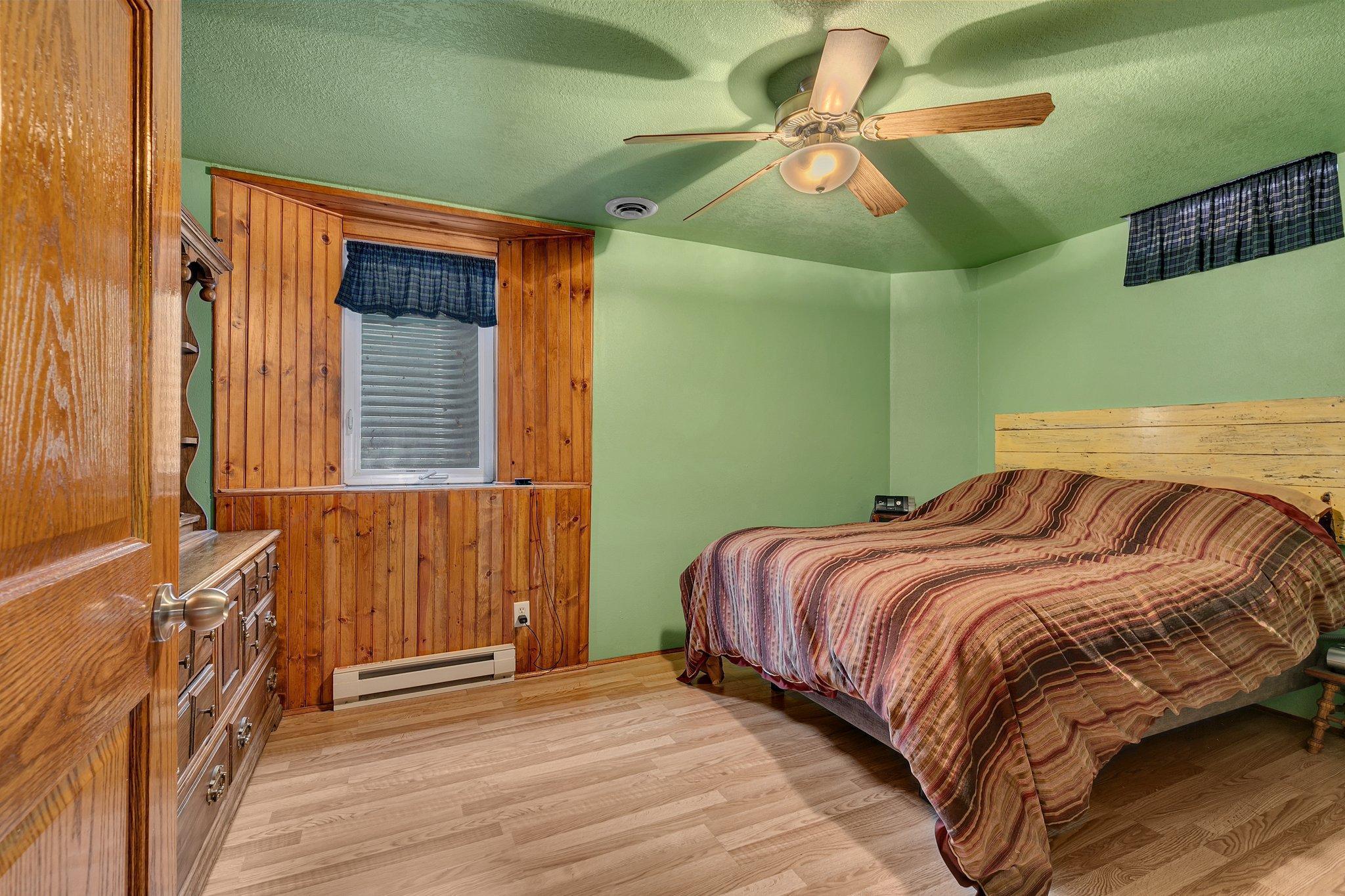 Lower level bedroom with egress window and walk-in closet.
