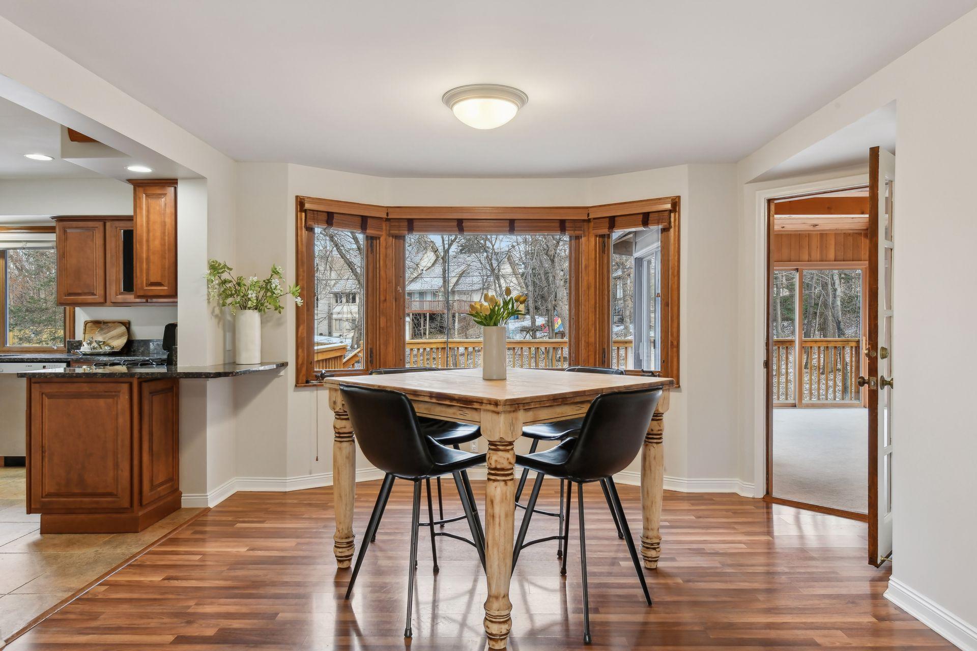 Large bay windows for more backyard views.