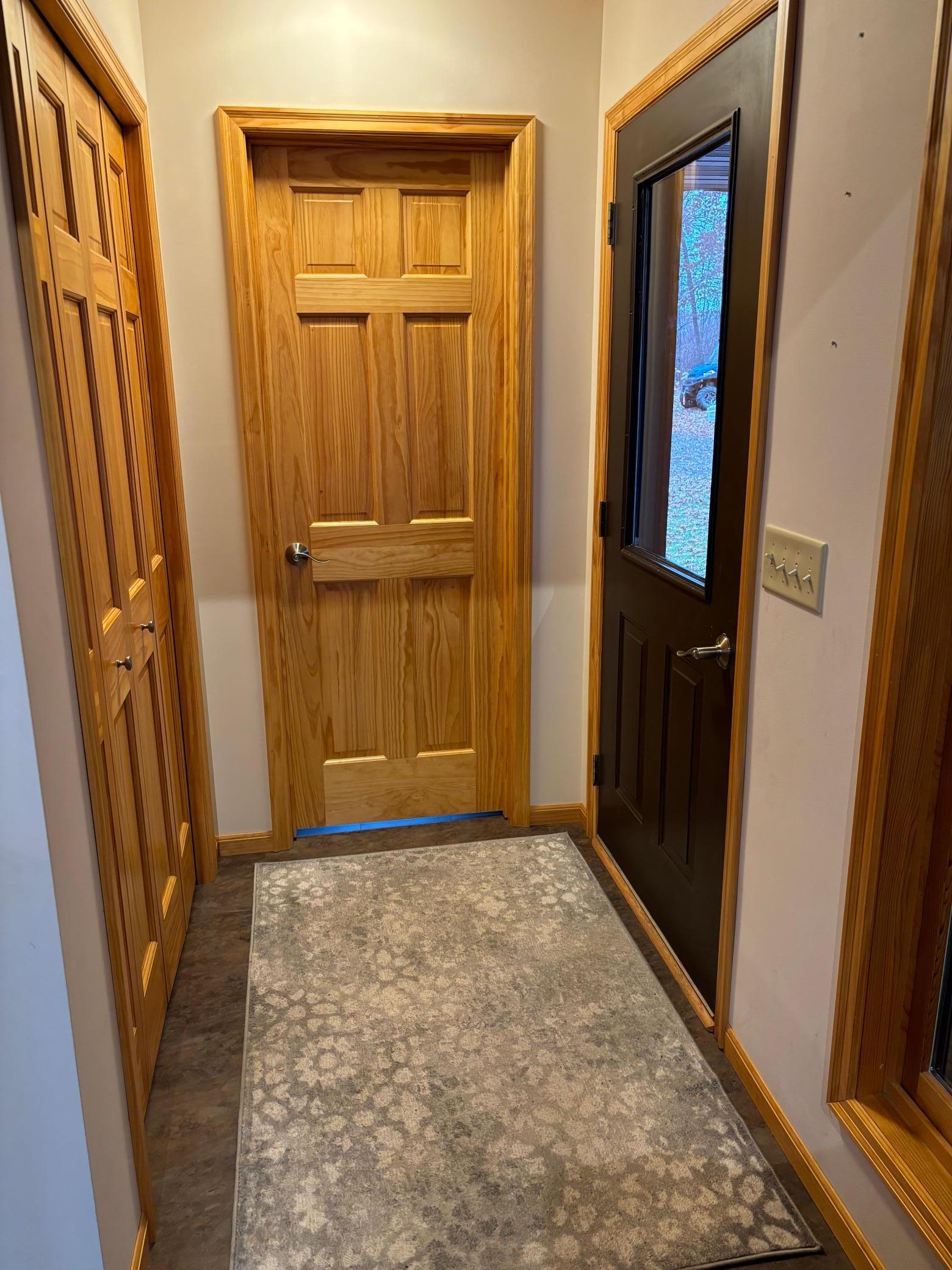 Entrance to home. A half bath at the entrance as well.