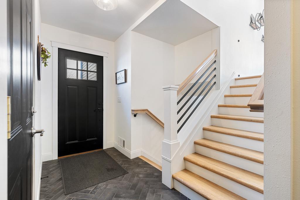 The entry foyer of the split level home offers access to the attached garage