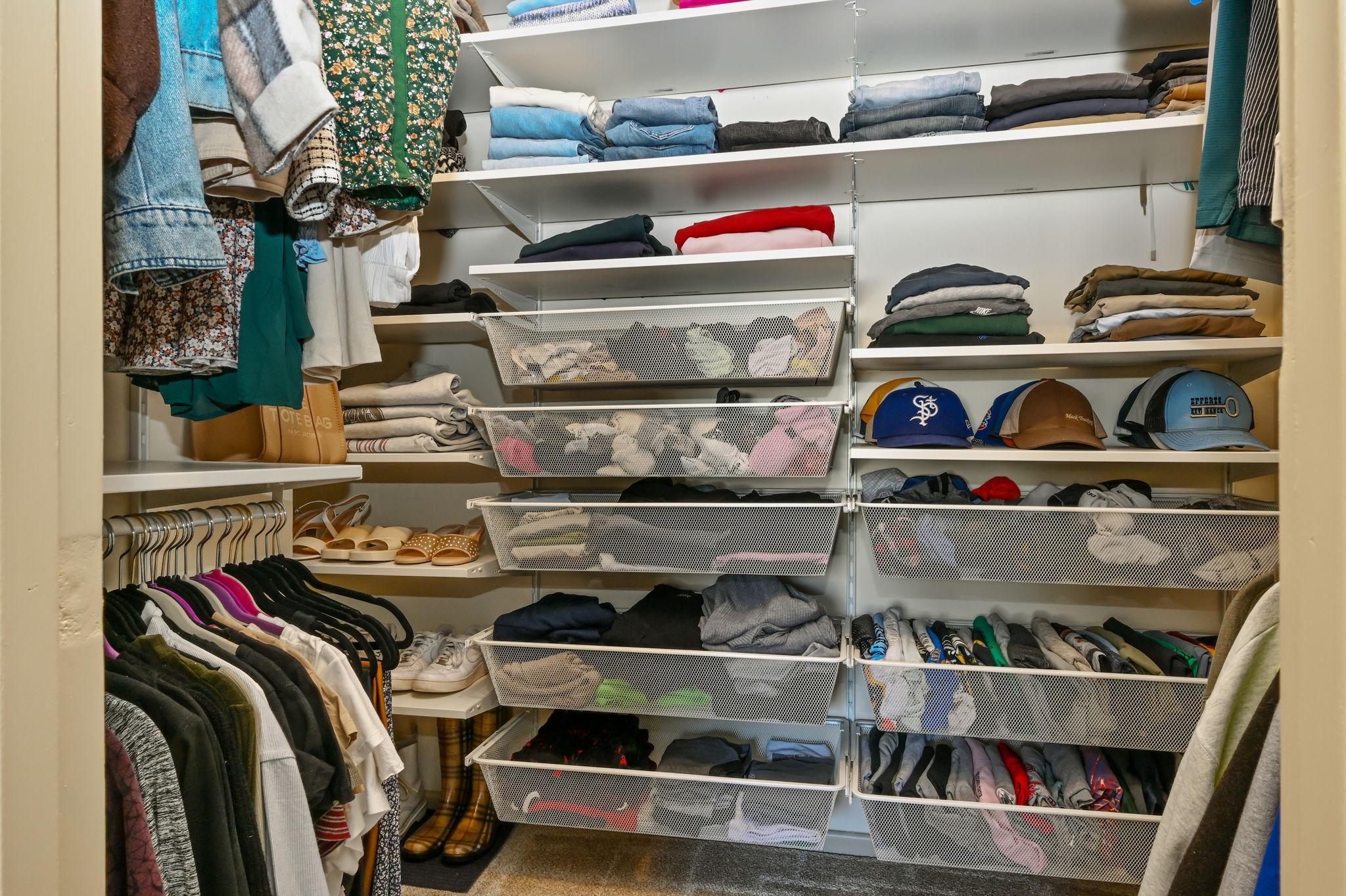 Large walkin closet with built in storage