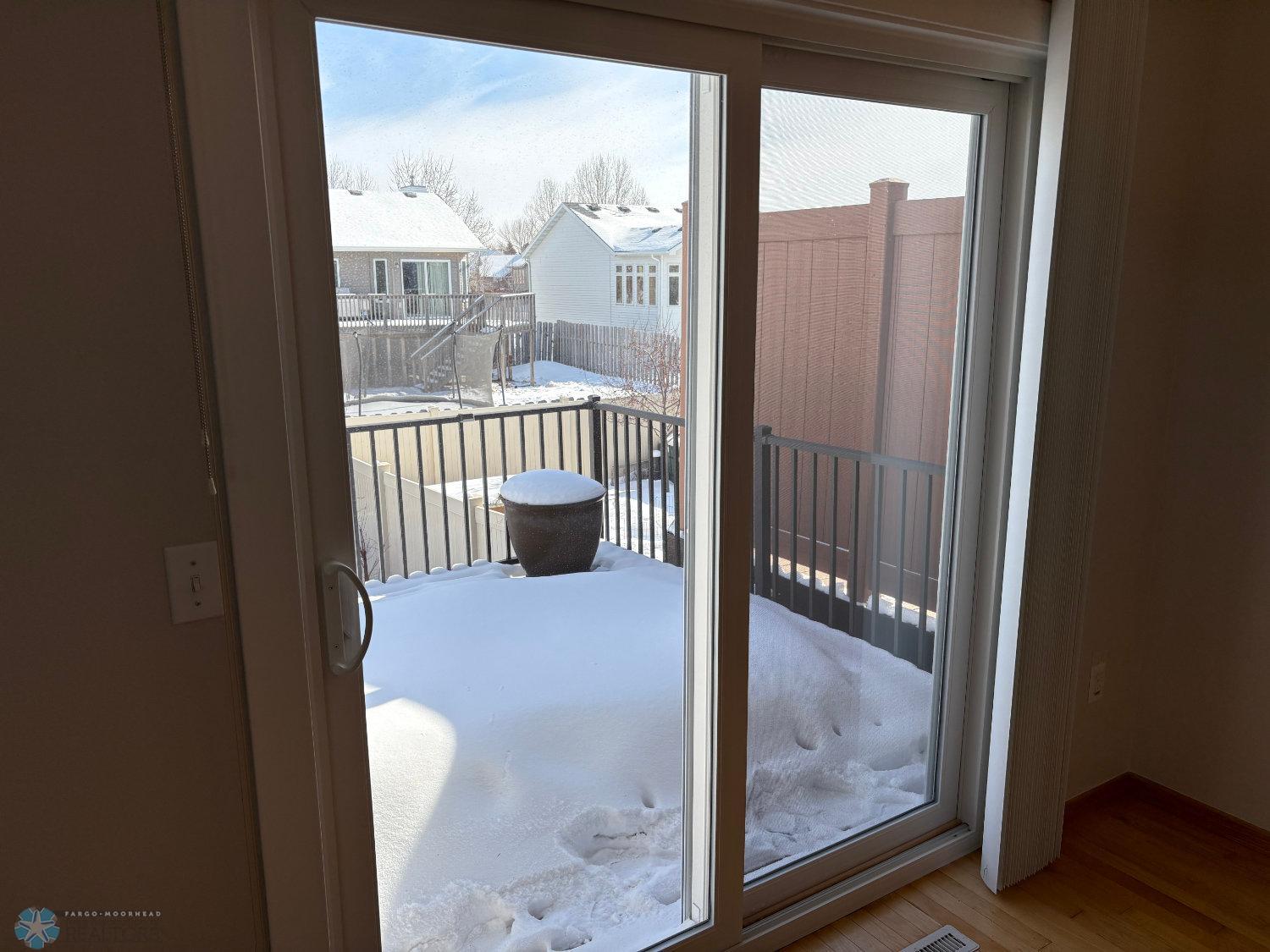 New vinyl patio door 2023-view to maintenance free deck new in 2019-view 1.jpg