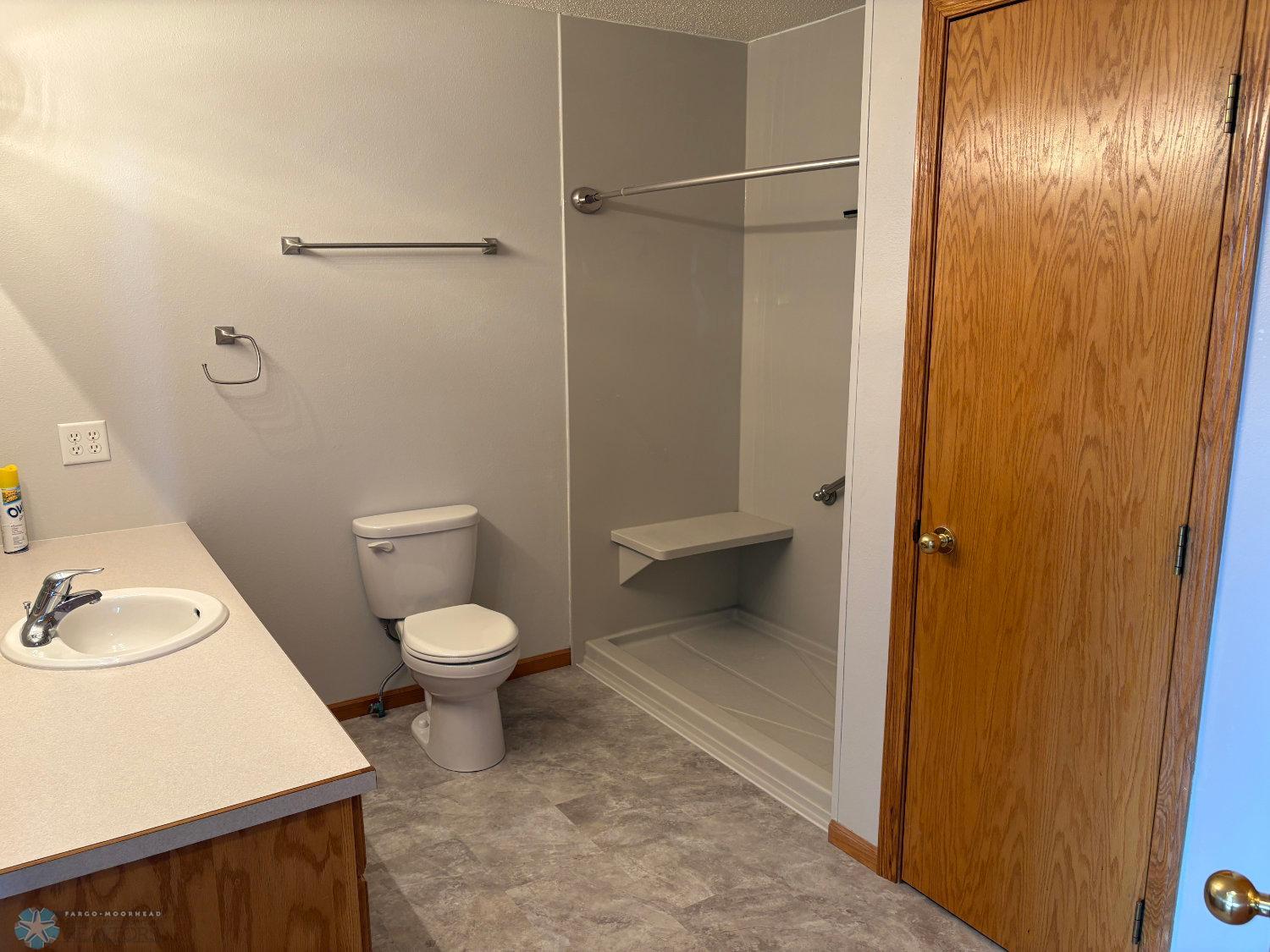 Upper level Hollywood bath with new vinyl flooring 2025 and new walk-in shower 2023-view 1.jpg