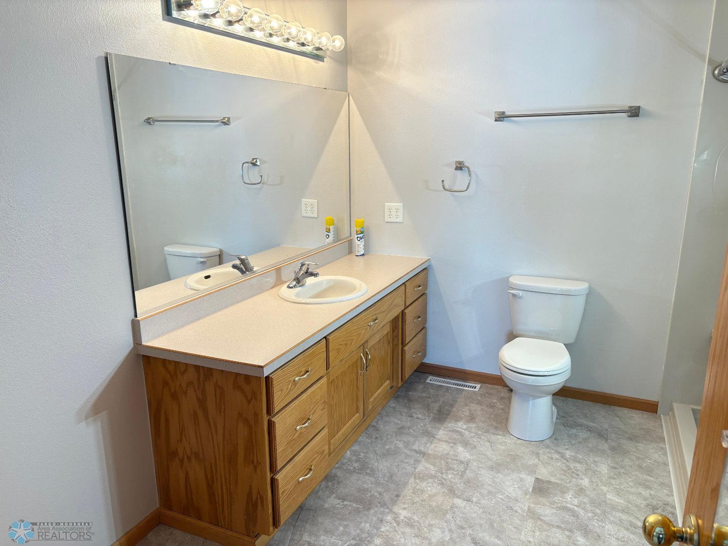 Upper level Hollywood bath with new vinyl flooring 2025 and new walk-in shower 2023-view 3.jpg