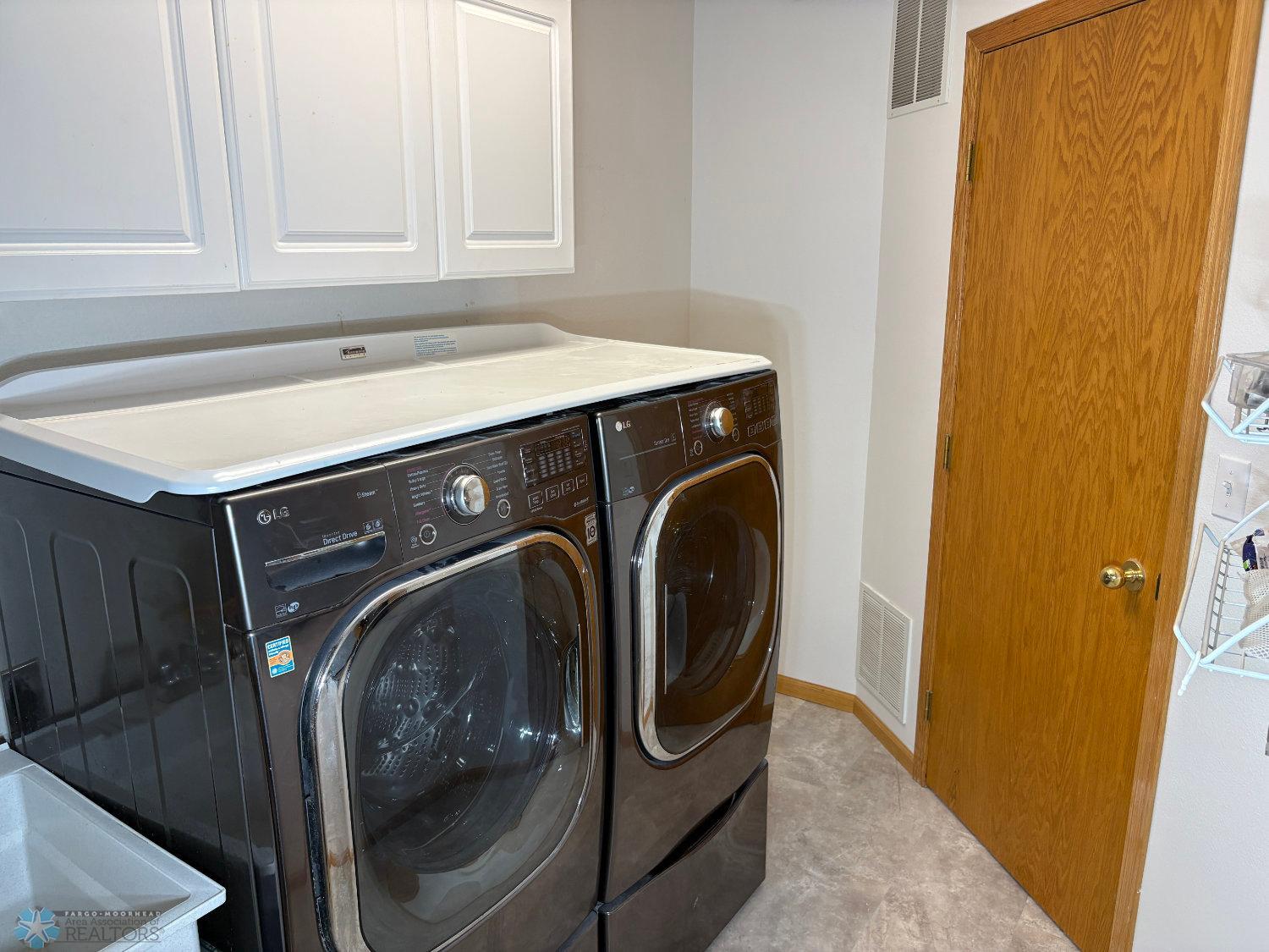 Laundry:Mechanical Room with front-loading washer and dryer included-view2.jpg