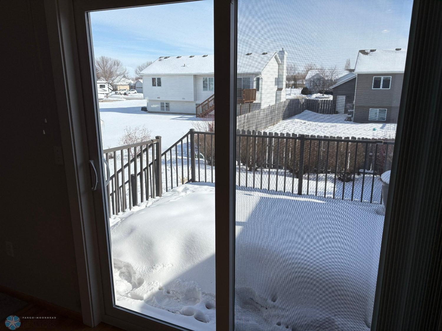 New vinyl patio door 2023-view to maintenance free deck new in 2019-view 2.jpg
