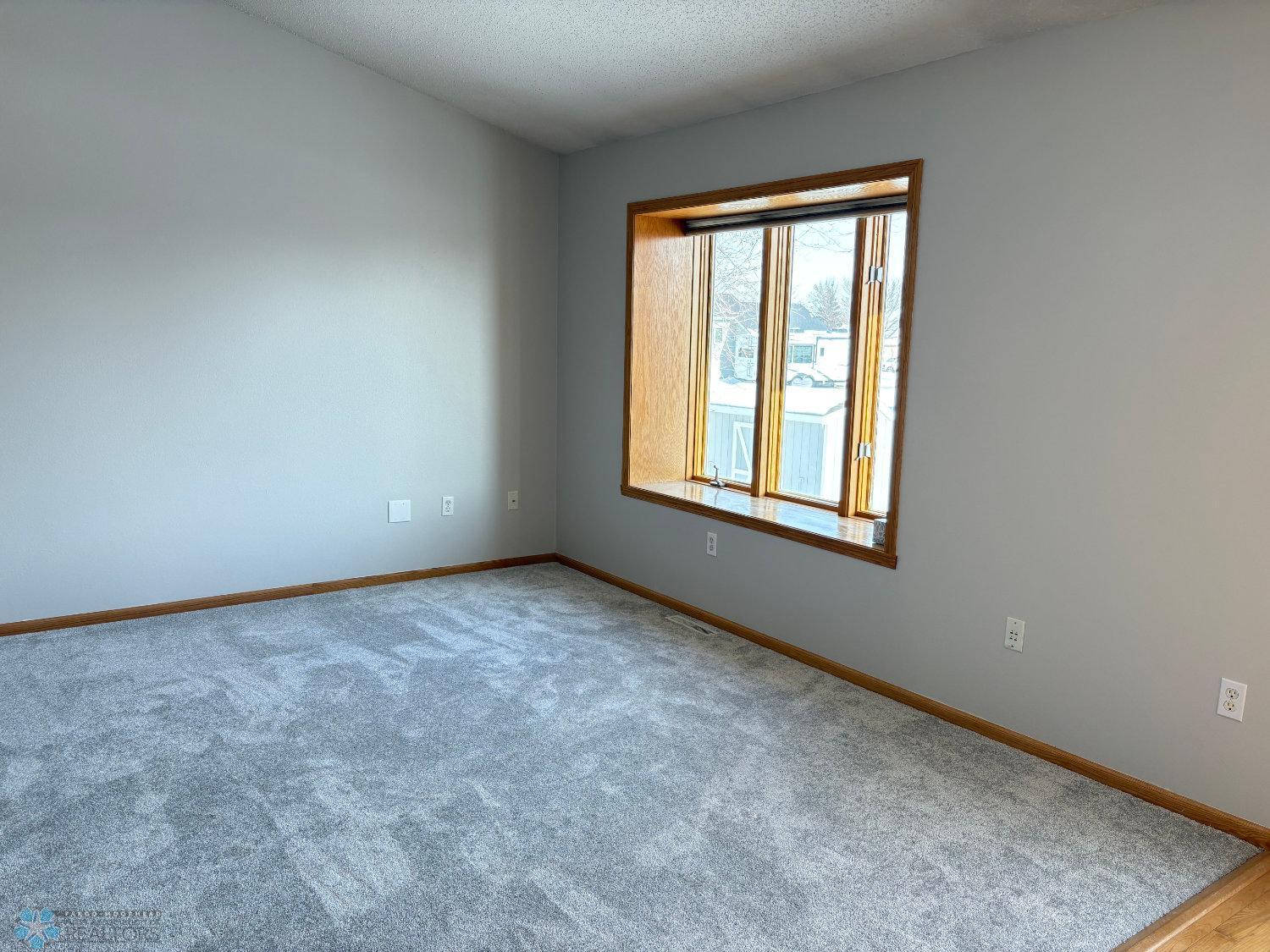 Vaulted living with new carpet February 2025-view 3.jpg