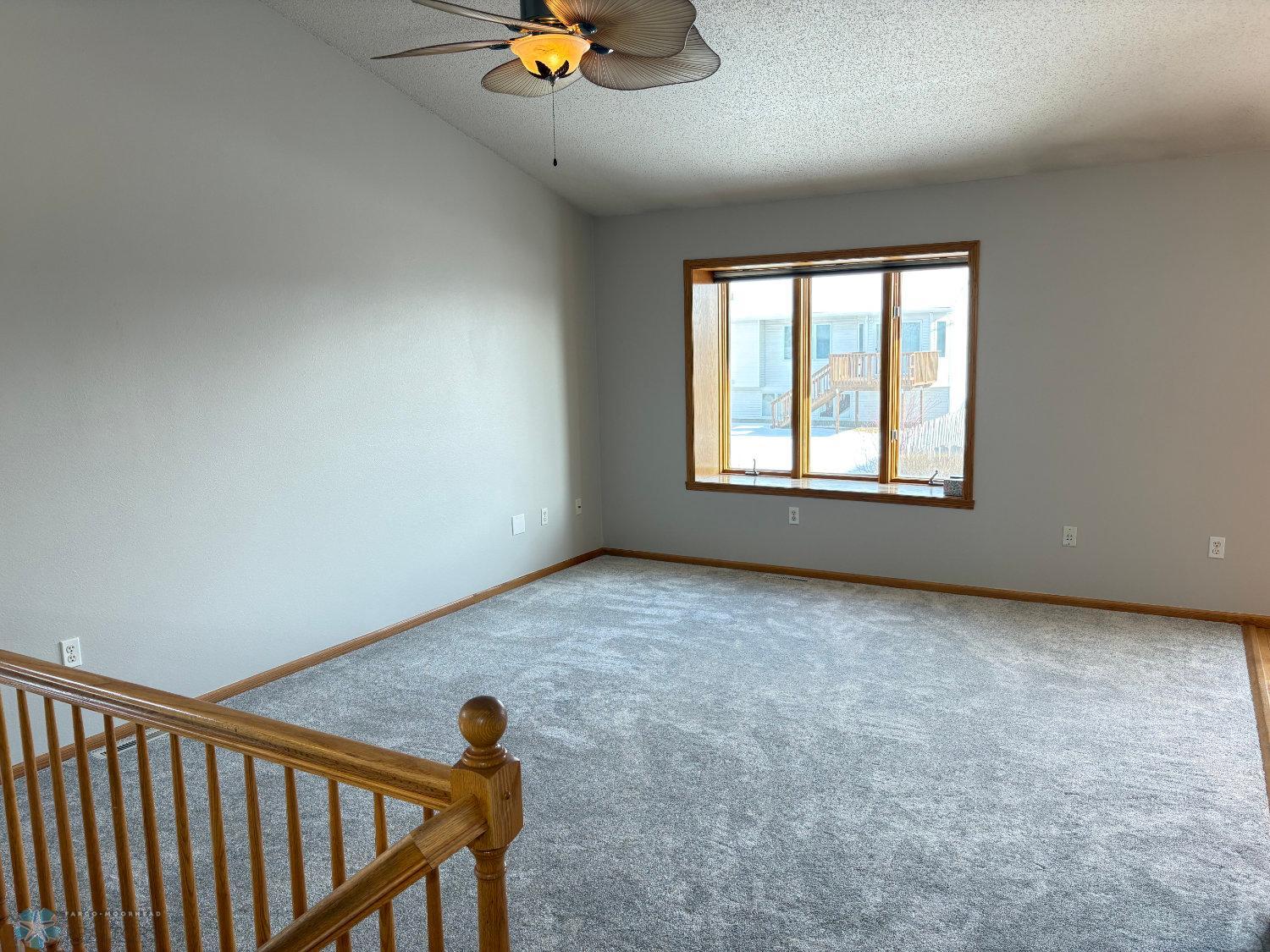 Vaulted living with new carpet February 2025-view 1.jpg