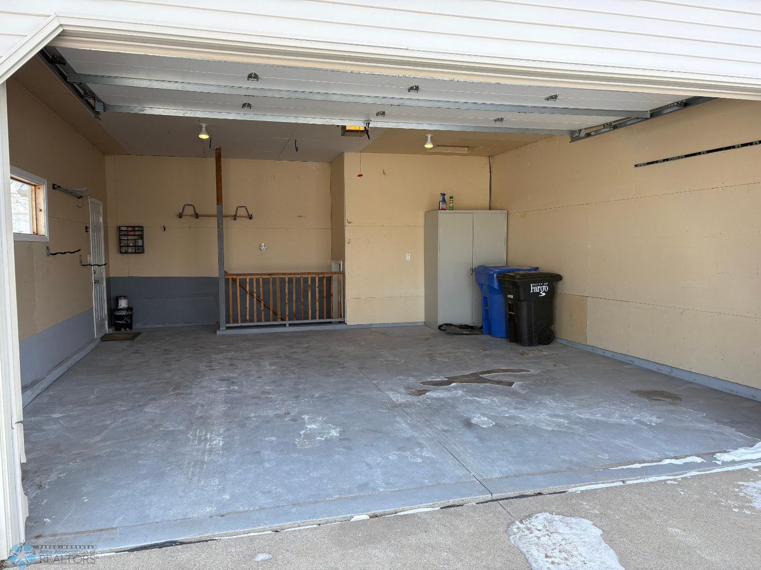 Large double garage-view 1 to interior from driveway.jpg