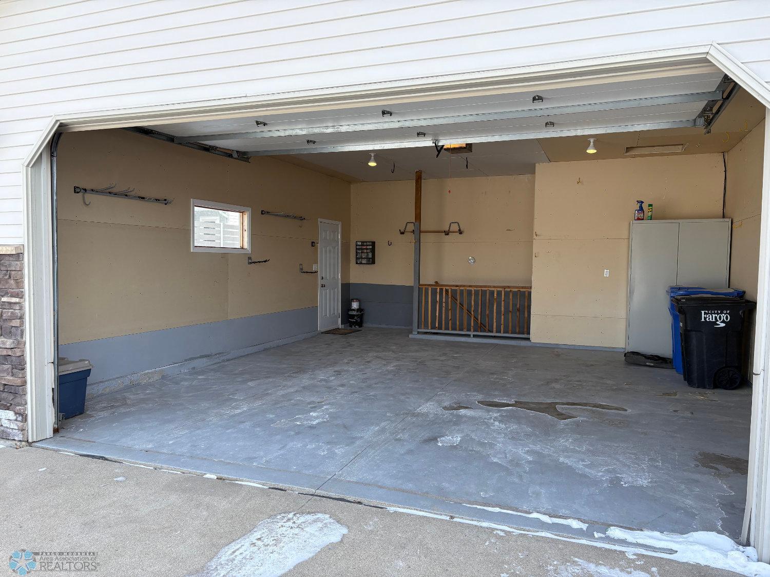 Large double garage-view 2 to interior from driveway..jpg