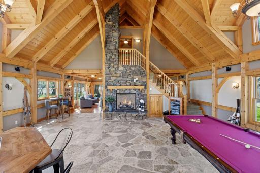 The amusment room with a staircase to a bedroom or office space