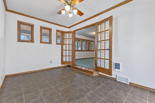 Breezeway with tiled flooring and supplemental heat