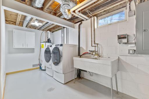Laundry Area in Unfinished Basement