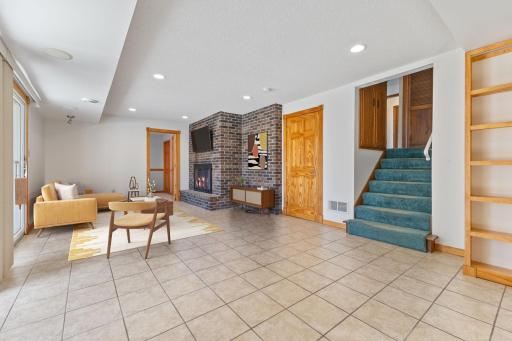 Lower Level Family Room with additional Wood Burning Fireplace!