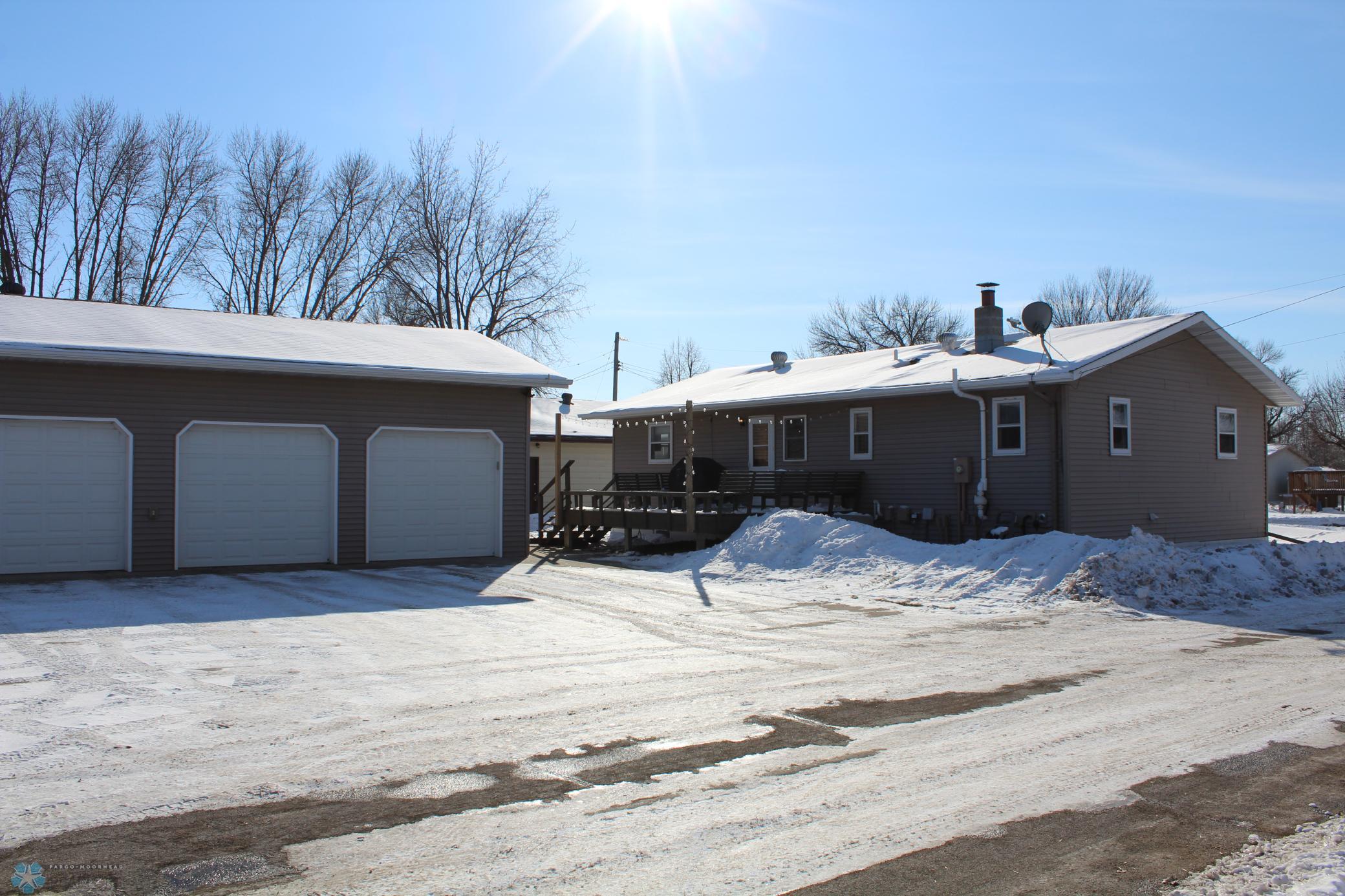 Main entry-5 bedrooms and 4 stall garage!